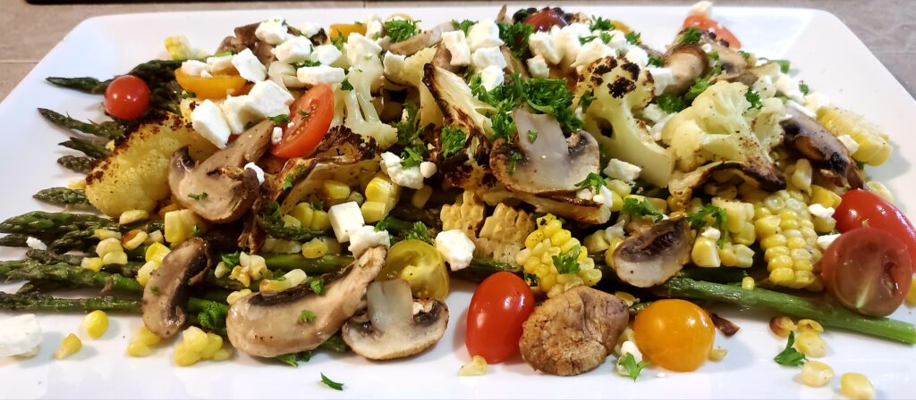 Roasted cauliflower, asparagus, corn, and feta salad.