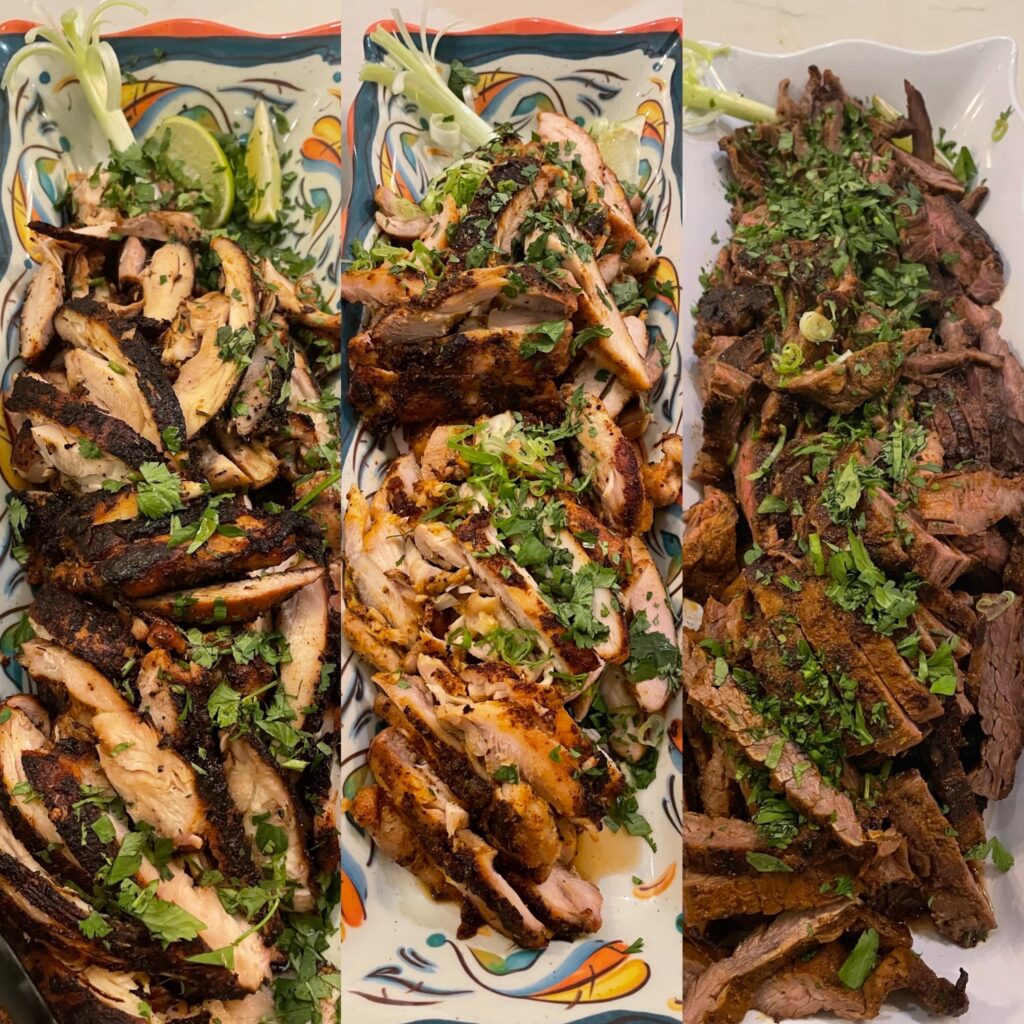 Grilled chicken and steak with cilantro garnish.