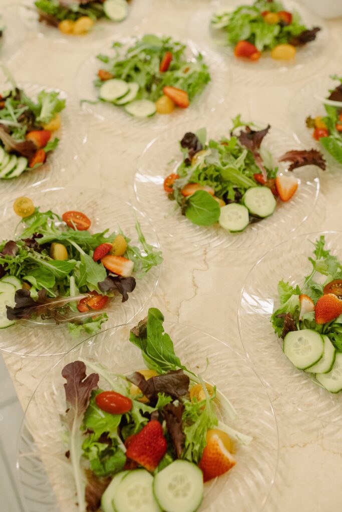 Fresh salad with cucumber, tomatoes, and strawberries.