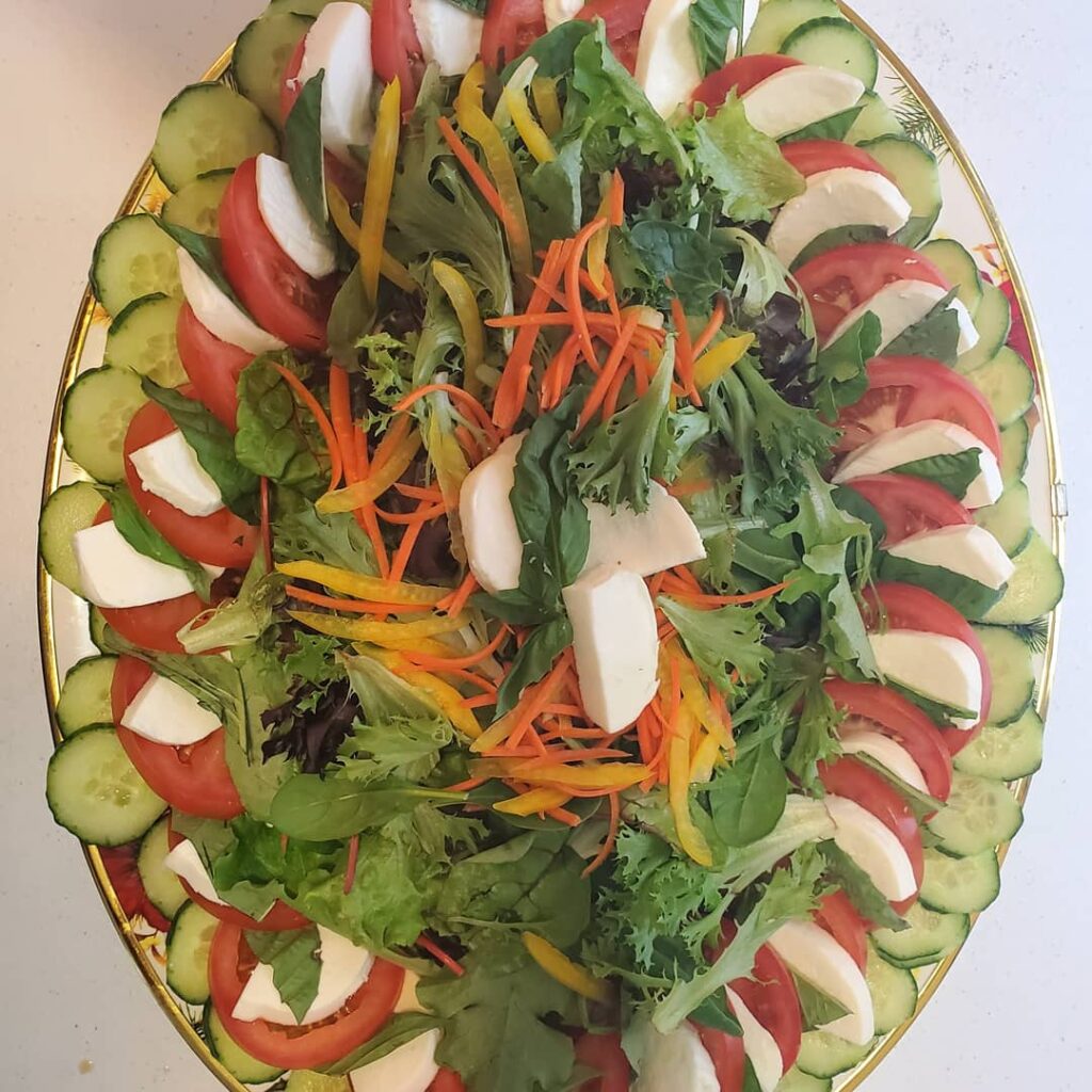A plate of food that is on the table.