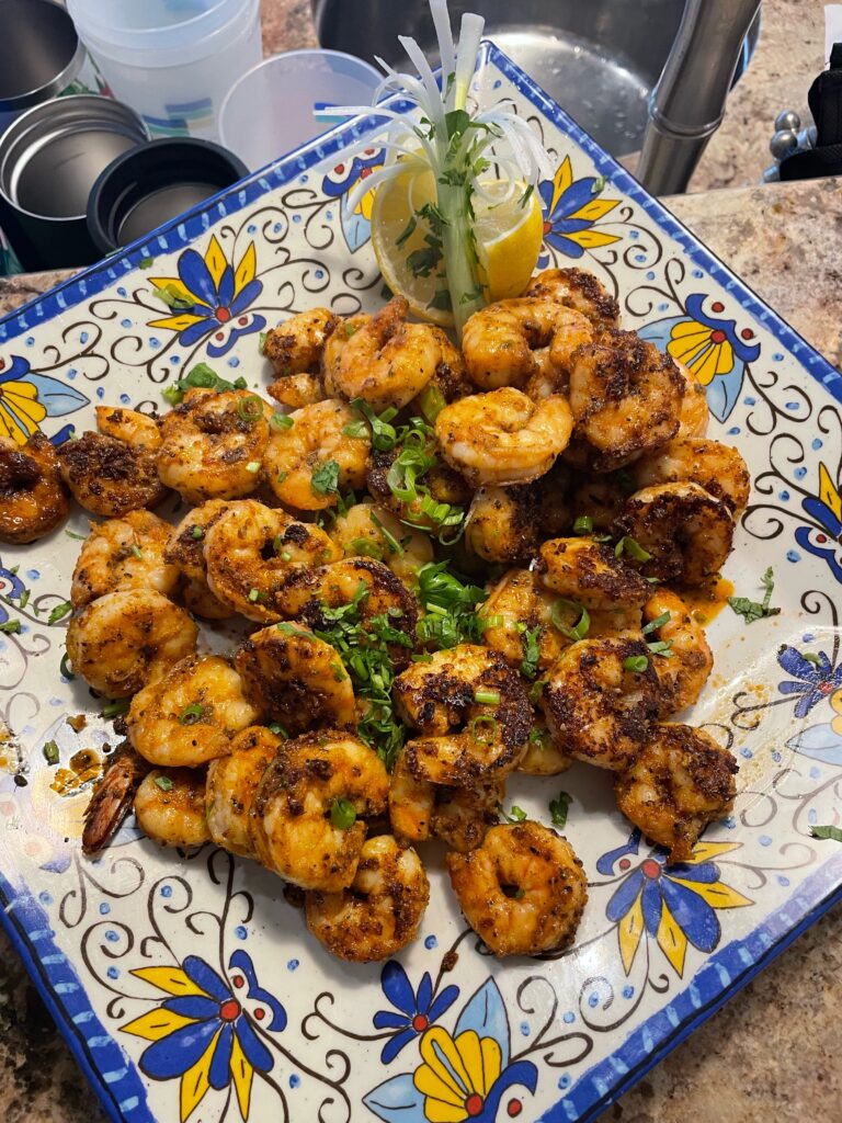 A plate of food that is on the table.