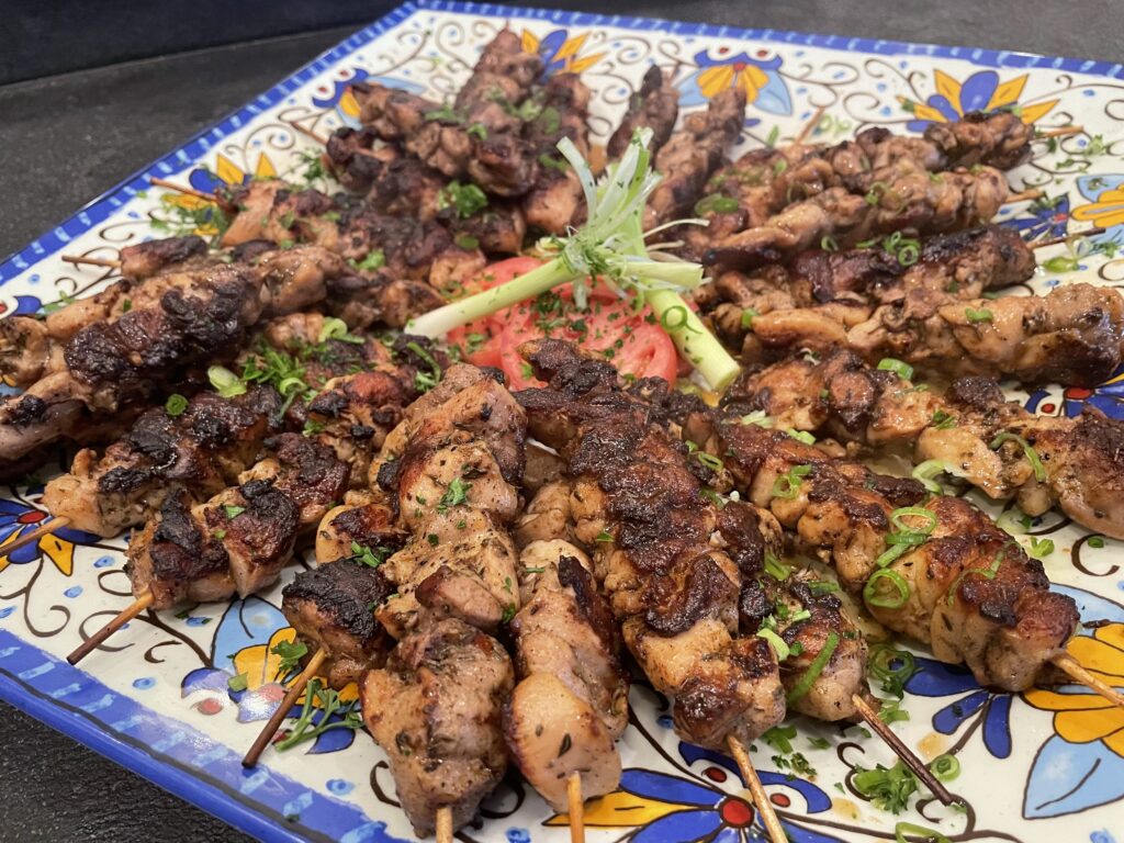 A plate of food that is on the table.